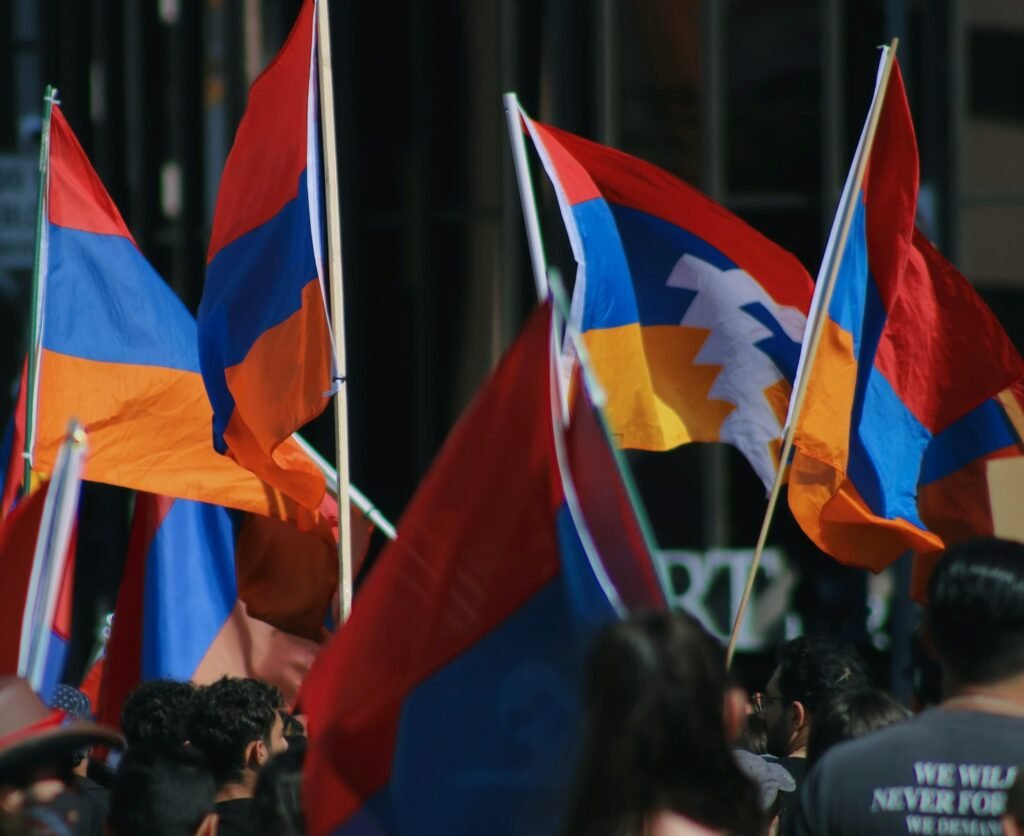 a group of people holding flags