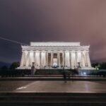 white concrete building at night