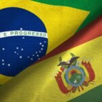 Bolivia and Brazil two flags together realations textile cloth fabric texture